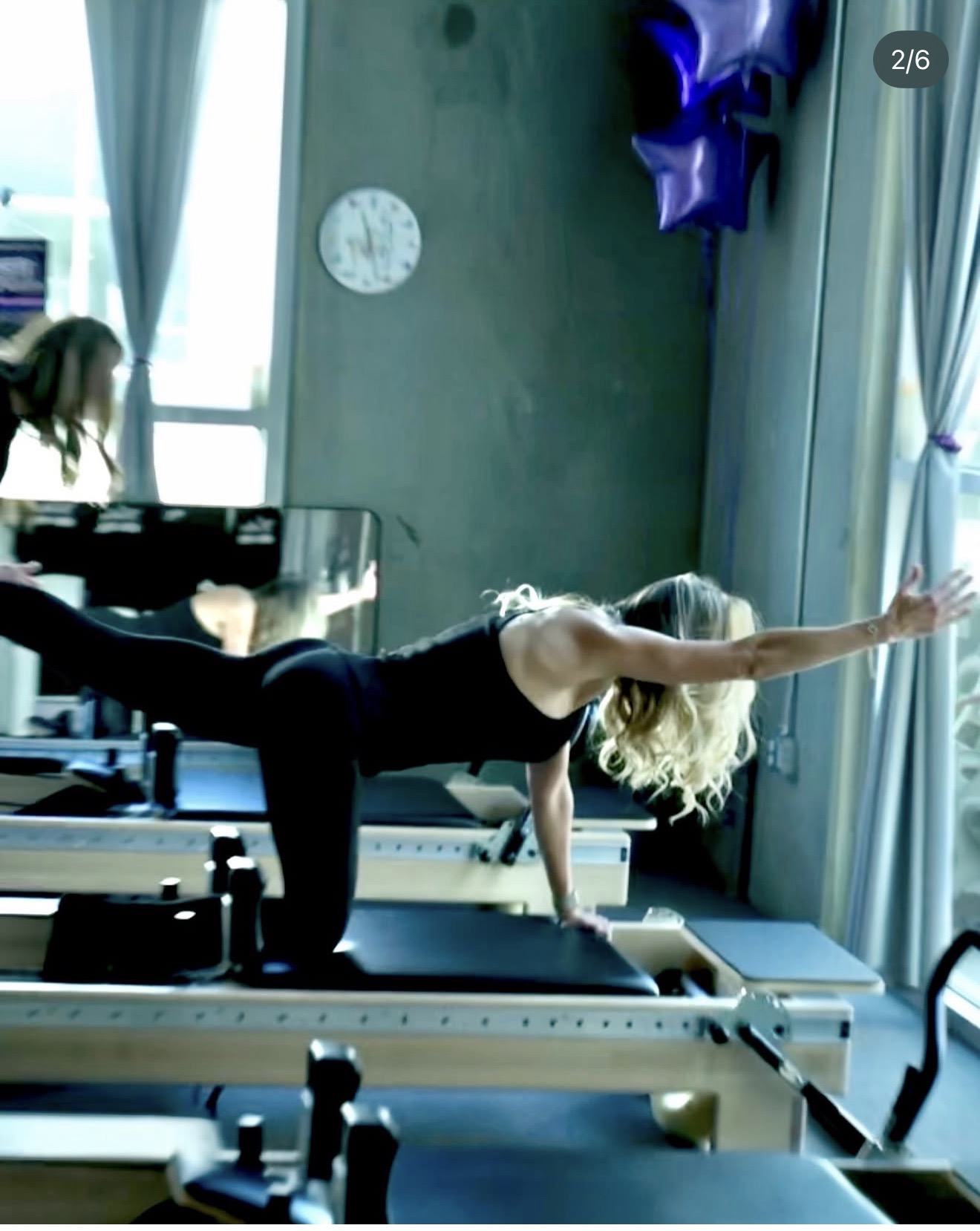 Crystal practicing Pilates